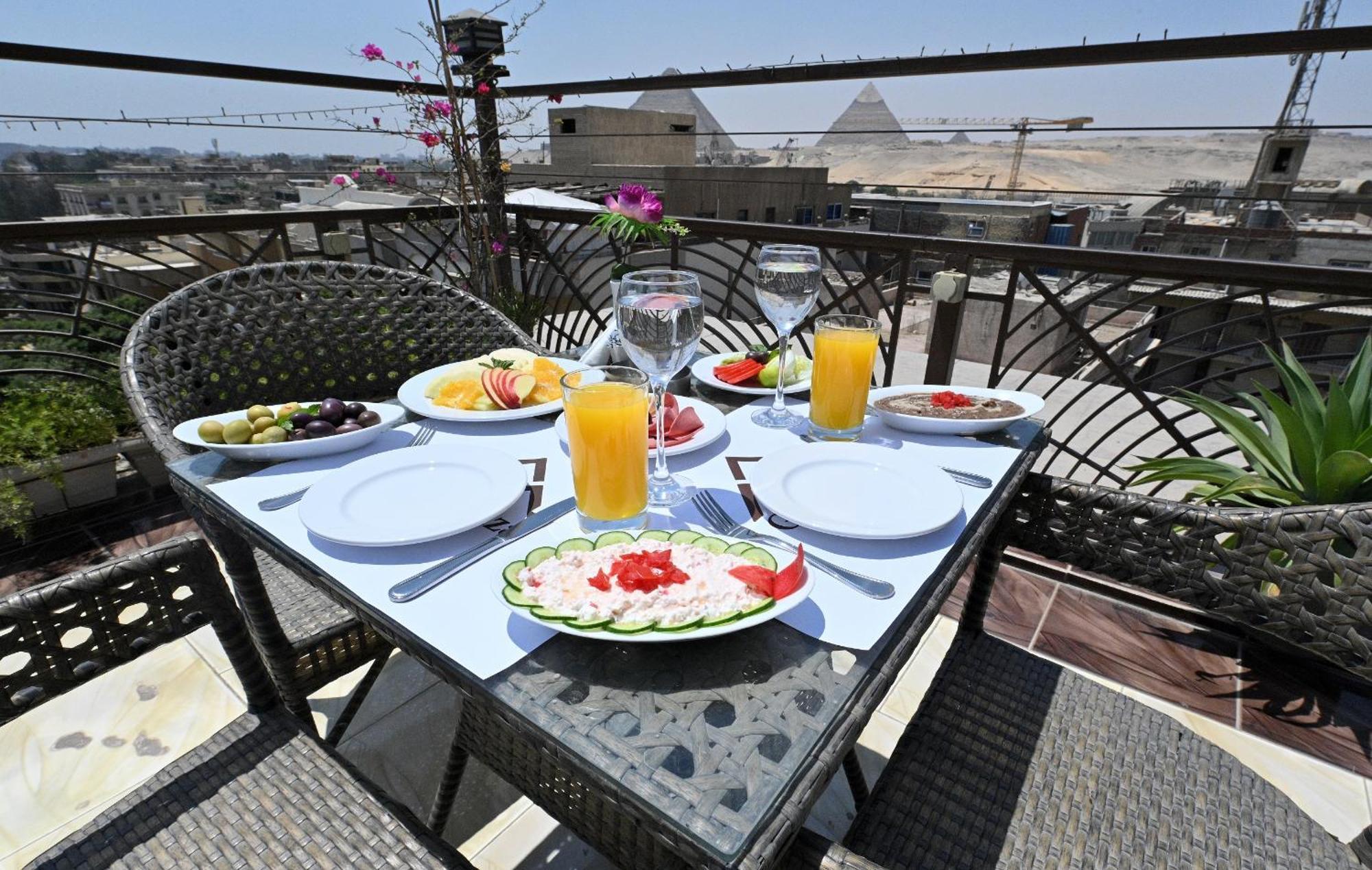 Pyramids Gem Plaza Hotel Kafret el-Gabal Kültér fotó