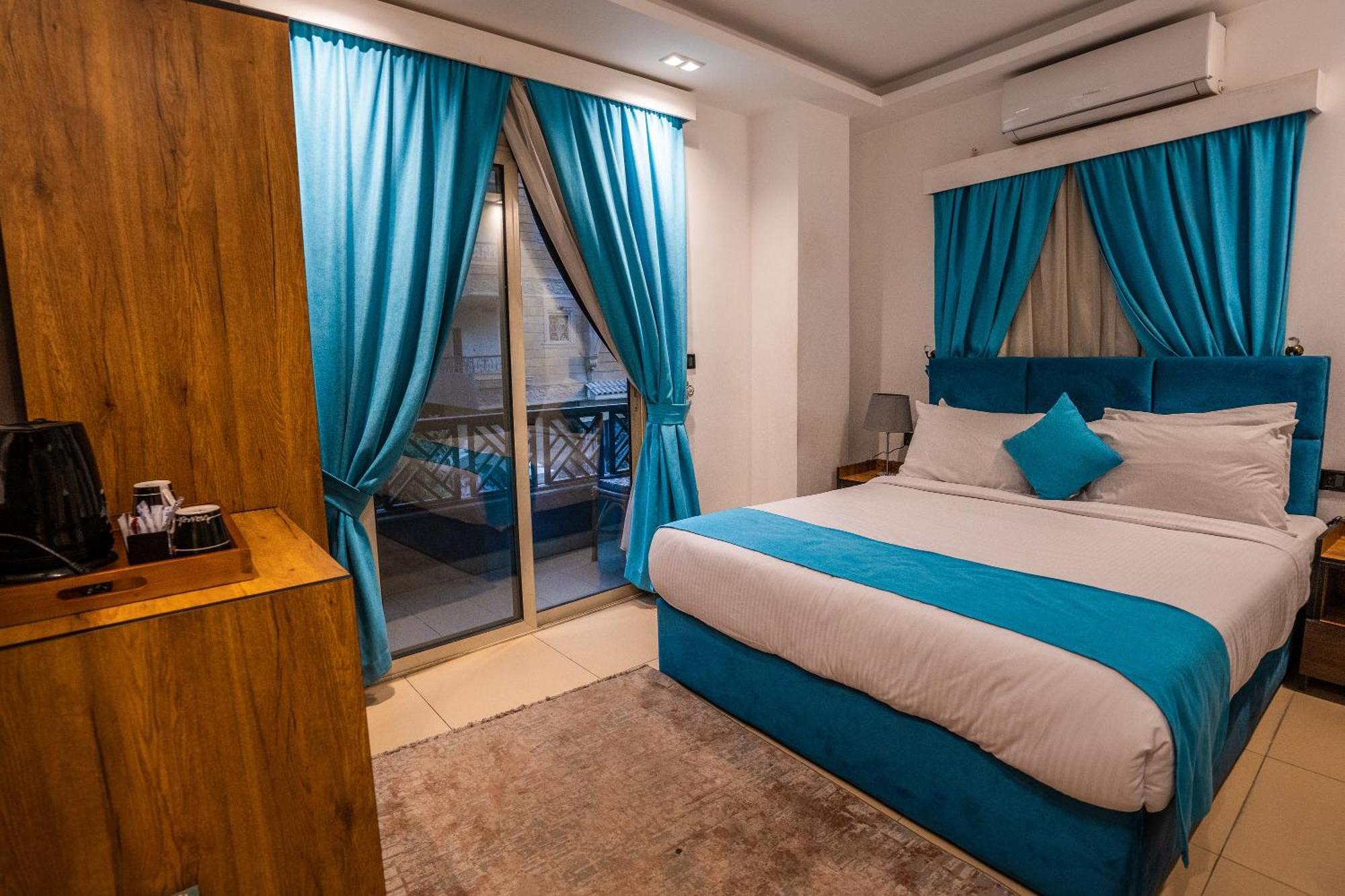 Pyramids Gem Plaza Hotel Kafret el-Gabal Kültér fotó